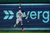 St. Louis Cardinals right fielder Dexter Fowler can't catch a fly ball by Kansas City Royals' Adalberto Mondesi that went for a triple during the first inning of a baseball game Tuesday, Sept. 22, 2020, in Kansas City, Mo. (AP Photo/Charlie Riedel)