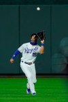 Kansas City Royals center fielder Whit Merrifield catches a fly ball for the out on Cleveland Indians' Tyler Naquin during the seventh inning of a baseball game, Monday, Aug. 31, 2020, in Kansas City, Mo. (AP Photo/Charlie Riedel)