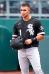 Chicago White Sox's Nick Madrigal stands on first base after hitting a single during the third inning of a baseball game against the Kansas City Royals Sunday, Aug. 2, 2020, in Kansas City, Mo. It was Madrigal's first major league hit. (AP Photo/Charlie Riedel)