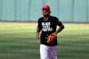 St. Louis Cardinals' Carlos Martinez wears a 