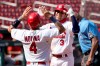 St. Louis Cardinals' Dylan Carlson, right, is congratulated by teammate Yadier Molina after hitting a two-run home run during the seventh inning of a baseball game against the Cincinnati Reds Sunday, Aug. 23, 2020, in St. Louis. (AP Photo/Jeff Roberson)
