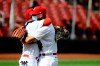 St. Louis Cardinals' Yadier Molina, left, celebrates with Adam Wainwright after Wainwright pitched nine complete innings against the Cleveland Indians, Sunday, Aug. 30, 2020, in St. Louis. (AP Photo/Scott Kane)