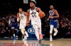 Utah Jazz guard Donovan Mitchell (45) brings the ball up during the second half of the team's NBA basketball game against the New York Knicks in New York, Wednesday, March 4, 2020. (AP Photo/Sarah Stier)