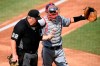 Washington Nationals catcher Kurt Suzuki, right, signals for assistance after umpire Joe West (22) was injured during the first inning of a baseball game against the Toronto Blue Jays, Thursday, July 30, 2020, in Washington. (AP Photo/Nick Wass)