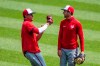 Washington Nationals shortstop Trea Turner, right, watches teammate Juan Soto, catches a fly ball during a baseball intrasquad game at Nationals Park, Sunday, Aug. 2, 2020, in Washington. (AP Photo/Manuel Balce Ceneta)