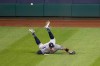 New York Yankees right fielder Aaron Judge cannot catch a hit by Washington Nationals' Asdrubal Cabrera for a double during the fifth inning of a baseball game at Nationals Park, Saturday, July 25, 2020, in Washington. (AP Photo/Alex Brandon)
