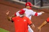 Washington Nationals' Juan Soto back, celebrates with manager Dave Martinez, after the Nationals defeated the New York Mets 5-3 a baseball game in Washington, Tuesday, Aug. 4, 2020. (AP Photo/Manuel Balce Ceneta)