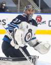 Jason Franson / The Canadian Press
Connor Hellebuyck's 32 saves on 33 shots were a key ingredient in the Jets' victory Wednesday night.