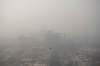 Altaf Qadri / The Associated Press FILE
Smog envelopes the New Delhi skyline on Nov. 4, 2020.