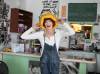 JESSICA LEE / WINNIPEG FREE PRESS
Blondies have more fun: Sandy Doyle, owner of Blondie’s Burgers, sporting a hamburger hat she sold to the next owner of her Main Street restaurant.