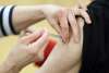 Kevin King / POOL Needle into arm at the COVID-19 vaccination super site at RBC Convention Centre in downtown Winnipeg on Mon., March 1, 2021. Kevin King/Winnipeg Sun/Postmedia Network