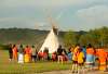 Mark Taylor / The Canadian Press
A vigil takes place where ground-penetrating radar recorded hits of what are believed to be 751 unmarked graves near the grounds of the former Marieval Indian Residential School on the Cowessess First Nation, Sask., on Saturday.