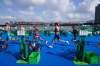 Tyler Mislawchuk (centre) runs through the second transition during the men&rsquo;s individual triathlon at the Summer Olympics in Tokyo. (David Goldman / The Associated Press)