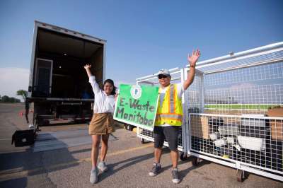 MIKE SUDOMA / Winnipeg Free Press
University student Aira Villanuvea is joined by her father, Rodrigo Villanuvea, as she hosts an electronic waste drop-off event at Tyndall Park Community Centre.