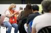 The fourth wave will be minimized if Manitobans, such as those awaiting their shot from Karen Balzer, continue to get vaccinated. (John Woods / The Canadian Press)