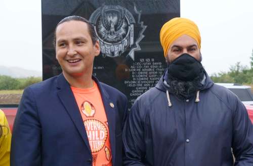 NDP Leader Jagmeet Singh is greeted by Cowessness Chief Cadmus Delorme on the Cowessness First Nation, Sask, Friday. THE CANADIAN PRESS/Paul Chiasson