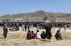 Shekib Rahmani / The Associated Press FILES
Hundreds of people gather near the international airport in Kabul, Afghanistan, on Aug. 16, hoping to find safe passage out of the country after the Taliban takeover.