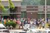 Parents of students from Volunteer High School in Church Hill, Tenn., await news on Aug. 10 after reports of an active shooter, which was eventually declared a hoax and believed to have originated in Manitoba. (Larry N. Souders / The Associated Press files)