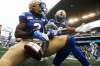 John Woods / The Canadian Press
Winnipeg Blue Bombers&rsquo; Jonathan Kongbo (2) and Jontrell Rocquemore (36) celebrate a Banjo Bowl win over the Saskatchewan Roughriders on Saturday.