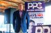 Peoples Party of Canada leader Maxime Bernier waits to speak during a rally held in Vegreville Alta., on Sunday. THE CANADIAN PRESS/Jason Franson