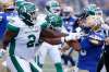 John Woods / The Canadian Press
Winnipeg Blue Bombers' Andrew Harris, right, fights with Saskatchewan Roughriders players during the first half of the Banjo Bowl, Saturday.