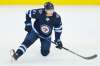 Winnipeg Jets' Dominic Toninato warms up prior to NHL pre-season game action against the Calgary Flames in Winnipeg on Wednesday. THE CANADIAN PRESS/John Woods
