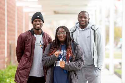 MIKE SUDOMA / Winnipeg Free Press
Wilfred Sam-King, founder of the Rising Stars Foundation (left), with Rising Stars bursary winner Eniola Soetan, one of two program participants recognized for their contribution to their community, and Olympic medallist Jerome Blake.