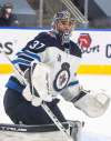 THE CANADIAN PRESS FILES/Jason Franson
Connor Hellebuyck's wife Andrea gave birth to the couple's first child Tuesday.