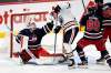 Winnipeg Jets goaltender Connor Hellebuyck makes a save as Edmonton Oilers' Jesse Puljujarvi looks for a rebound during the second period Tuesday. THE CANADIAN PRESS/Fred Greenslade