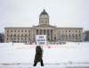 University of Manitoba Faculty Association members strike in front of the legislative building on Wednesday. (Jessica Lee / Winnipeg Free Press)