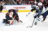 Edmonton goalie Stuart Skinner (left) keeps Andrew Copp off the scoresheet Thursday during the Oilers&rsquo; 2-1 shootout victory over the Jets. (Jason Franson / The Canadian Press)