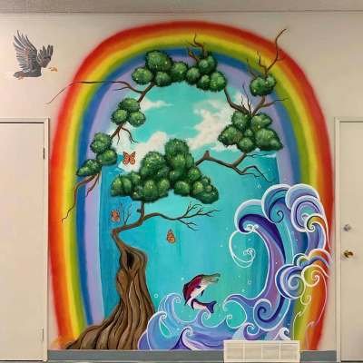 Robin Love painted the Rainbow Portal mural inside the South Winnipeg Family Information Centre rented space in the basement of Fort Garry United Church. (Supplied)