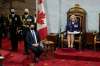 Prime Minister Justin Trudeau looks on as Gov. Gen. Mary Simon delivers the Throne Speech in the Senate in Ottawa on Tuesday, Nov. 23, 2021. THE CANADIAN PRESS/Adrian Wyld