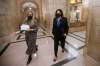 Manitoba Premier Heather Stefanson, right, walks to her office with her assistant Olivia Billson after speaking to media prior to the reading of the Speech from the Throne at the Manitoba Legislature Tuesday. THE CANADIAN PRESS/John Woods