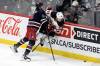 Winnipeg Jets defenceman Brenden Dillon (left) believes the new rules will still make everyone feel safe. (Fred Greenslade / The Canadian Press files)