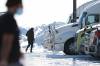 JOHN WOODS / WINNIPEG FREE PRESS
Working drivers head to their trucks at a truck stop in Headingley, Sunday. Many truckers were on the job, hauling goods across Canada.