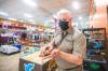 Rodger Salm, a Winnipeg-based marketing director for Petland Canada, with a tortoise. The company is against the proposed bylaw changes. (Mikaela MacKenzie / Winnipeg Free Press)