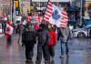 THE CANADIAN PRESS/Frank Gunn
Anti-mandate protesters walk on Parliament Hill in Ottawa on Feb. 13.