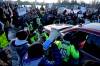 Residents surround a pick up truck as a police officer tries to negotiate with the driver so they can be released from a counter protest on Riverside Drive, after residents prevented vehicles from driving in a convoy to Parliament Hill, on the 17th day of a protest against COVID-19 measures that has grown into a broader anti-government protest, in Ottawa, Sunday, Feb. 13, 2022. THE CANADIAN PRESS/Justin Tang