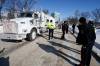 A Winnipeg police officer talks with the lead driver of a convoy of COVID-19 mandate protesters last week. (John Woods / Winnipeg Free Press files)