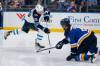 Winnipeg Jets' Blake Wheeler shoots past St. Louis Blues' Marco Scandella during the third period. (Jeff Roberson / The Associated Press)