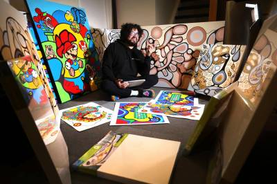 RUTH BONNEVILLE / WINNIPEG FREE PRESS
Blake Angeconeb’s unpretentious and joyful approach to art has resonated with many. His social media following has grown to more than 16,000 strong.