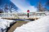 Marianne Cerilli beside Omand’s Creek, where raw sewage was spilled after snowmelt overwhelmed construction being done to replace a combined sewer interceptor pipe. (Mikaela MacKenzie / Winnipeg Free Press)