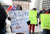 RUTH BONNEVILLE / WINNIPEG FREE PRESS
Councillor from Fox Lake Cree Nation, Sophie Lockhart, holds sign saying “Arlen Dumas Must Go” at a rally outside the Winnipeg headquarters of the Assembly of Manitoba Chiefs.