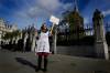 (AP Photo/Kirsty Wigglesworth)
A climate demonstrator stands outside parliament in London on Oct. 25.