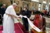 Former national chief of the Assembly of First Nations, Phil Fontaine, and residential school survivor Linda Daniels from the Long Plains First Nation (right), present Pope Francis with a stole that was made by Therese Dettanikkeaze from Northlands Denesuline Nation in Manitoba, at the Vatican, Friday, April 1, 2022. The final audience stands with Pope Francis and members of the Indigenous delegation where the Pontiff delivered an apology for the Catholic Church’s role in Canada’s residential school system, at the Vatican, Friday, April 1, 2022. THE CANADIAN PRESS/HO-Vatican Media *MANDATORY CREDIT*