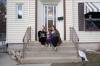 JESSICA LEE / WINNIPEG FREE PRESS
From left to right: Natalie Thieseen, Isabelle Balser and Karyn Balser, sitting outside their home. The family had avoided catching COVID until Natalie tested positive earlier last week during spring break.