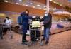 JESSICA LEE / WINNIPEG FREE PRESS
Dmytro Malyk, a volunteer with the Ukrainian Canadian Congress, helps Ukrainian refugee Tetiana Maksymtsiv with her luggage at Winnipeg James Armstrong Richardson International Airport after she arrived from Warsaw via Amsterdam and Toronto Wednesday evening.