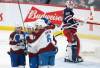 Colorado Avalanche’s Alex Newhook (18), Nicolas Aube-Kubel (16) and Erik Johnson (6) celebrate Aube-Kubel’s goal against Winnipeg Jets goaltender Connor Hellebuyck during the first period in Winnipeg, Friday. THE CANADIAN PRESS/John Woods