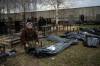 (AP Photo/Rodrigo Abd)
Nadiya Trubchaninova, 70, sits next to a body bag that contains the remains of her son Vadym, who was killed by Russian soldiers in Bucha on March 30.